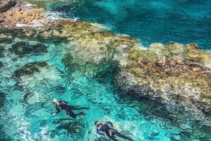 a pool of water with rocks